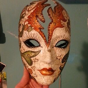 Decorative Venetian Mask with Orange and Green Accents
